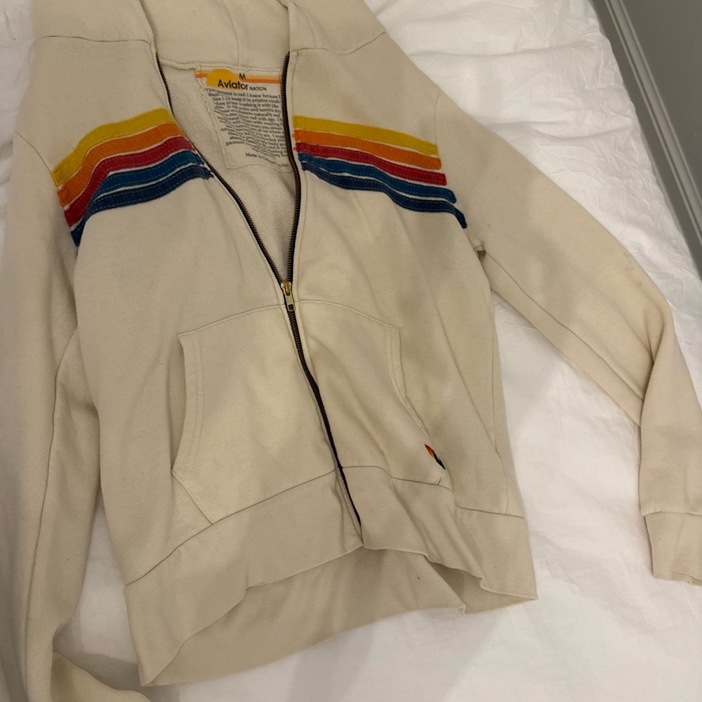 Cream Hoodie with Rainbow Stripe missing strings